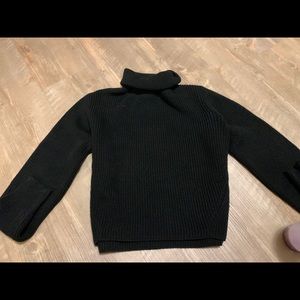 Black turtle neck sweater